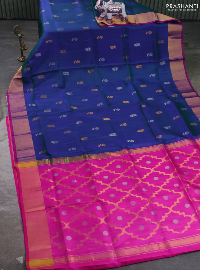 Pure uppada silk saree dual shade of bluish green and pink with allover annam & floral zari woven buttas and zari woven border