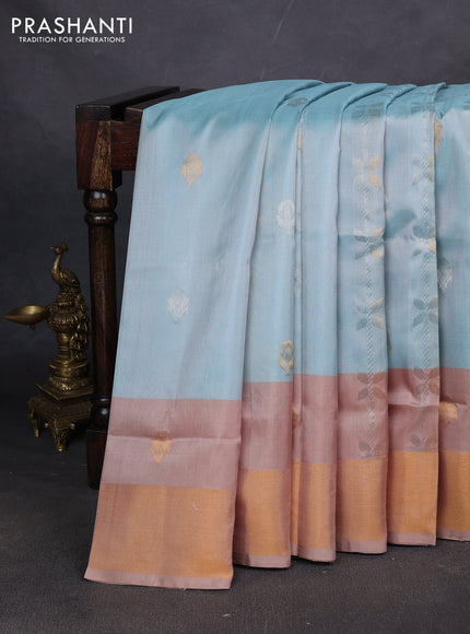 Pure uppada silk saree teal blue shade and pastel peach with allover zari stripe & buttas and long zari woven border