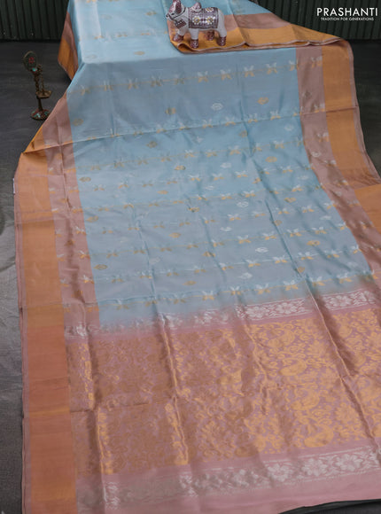 Pure uppada silk saree teal blue shade and pastel peach with allover zari stripe & buttas and long zari woven border
