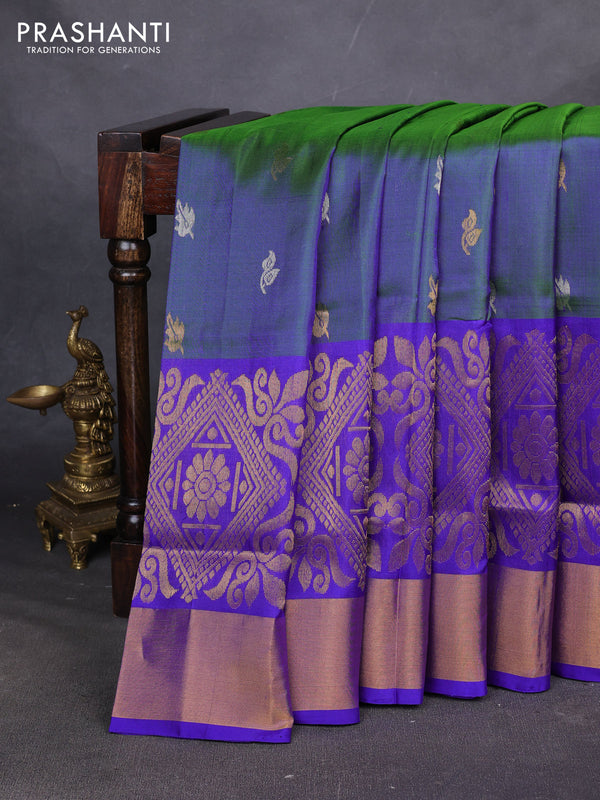 Pure uppada silk saree dual shade of bluish green and royal blue with allover silver & zari woven buttas and long zari woven border