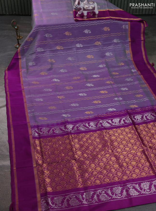 Pure uppada silk saree pastel purple and purple with allover zari stripe & butta and rettapet zari woven border