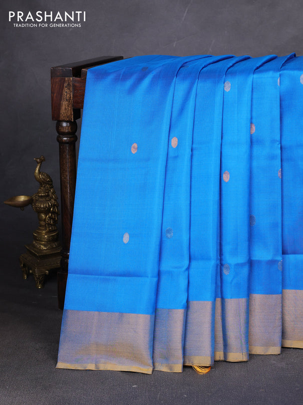 Pure uppada silk saree cs blue and mustard yellow with allover silver & zari woven buttas and zari woven border