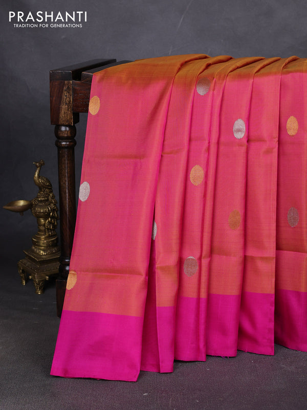 Pure uppada silk saree dual shade of pinkish orange and pink with allover silver & zari coin buttas and simple border