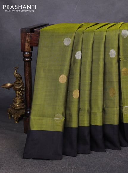 Pure uppada silk saree light green and black with allover silver & zari coin buttas and simple border