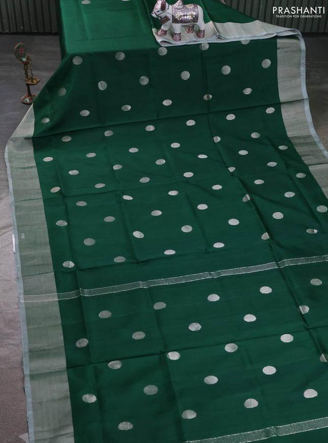 Pure uppada silk saree green with allover silver zari coin buttas and silver zari woven border