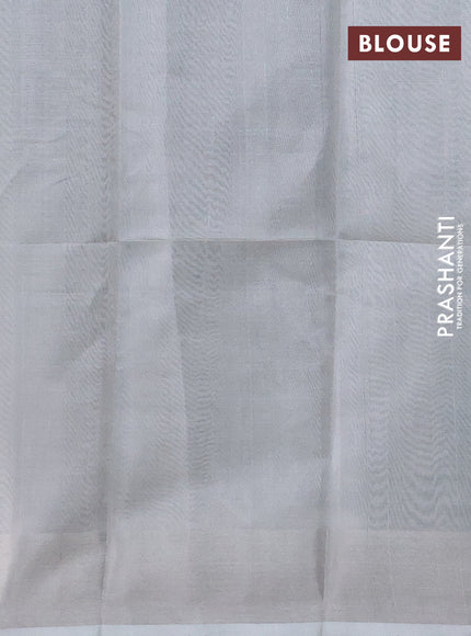 Pure uppada silk saree green with allover silver zari coin buttas and silver zari woven border