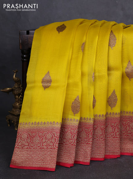 Banarasi organza silk saree yellow and red with allover thread & zari woven buttas and banarasi style border