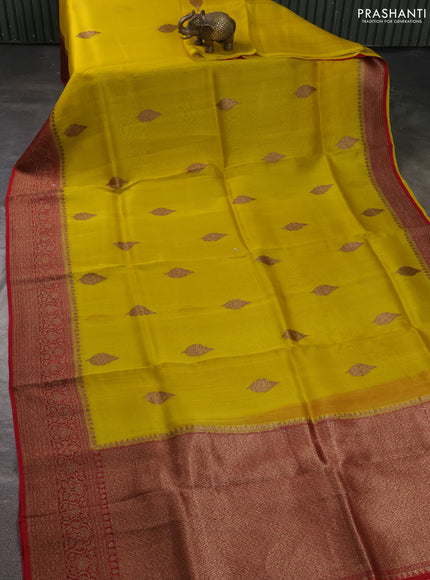 Banarasi organza silk saree yellow and red with allover thread & zari woven buttas and banarasi style border
