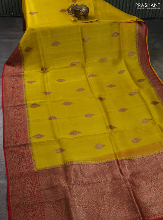 Banarasi organza silk saree yellow and red with allover thread & zari woven buttas and banarasi style border