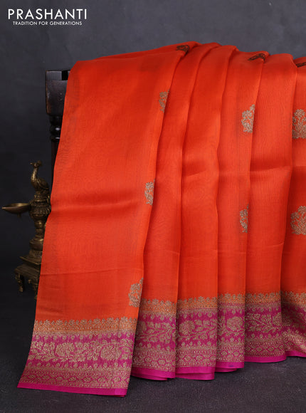 Banarasi organza silk saree orange and pink with allover thread & zari woven buttas and banarasi style border