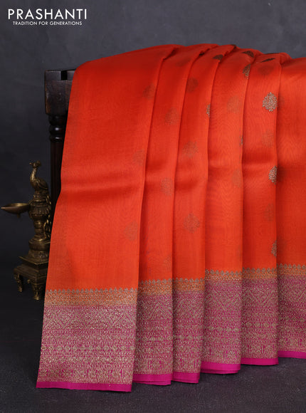 Banarasi organza silk saree orange and pink with allover thread & zari woven buttas and banarasi style border