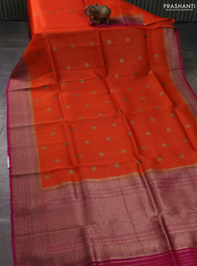Banarasi organza silk saree orange and pink with allover thread & zari woven buttas and banarasi style border