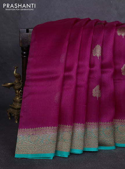 Banarasi organza silk saree magenta pink and teal green with allover thread & zari woven buttas and banarasi style border