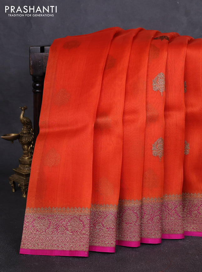 Banarasi organza silk saree orange and pink with allover thread & zari woven buttas and banarasi style border