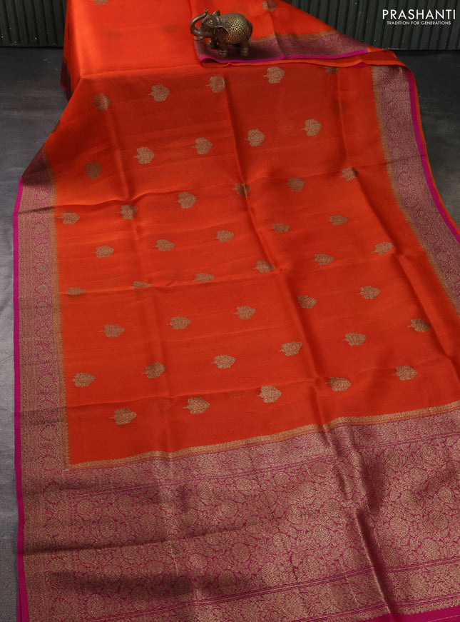 Banarasi organza silk saree orange and pink with allover thread & zari woven buttas and banarasi style border
