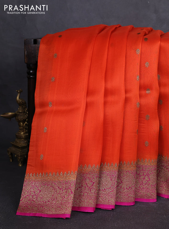 Banarasi organza silk saree orange and pink with allover thread & zari woven buttas and banarasi style border