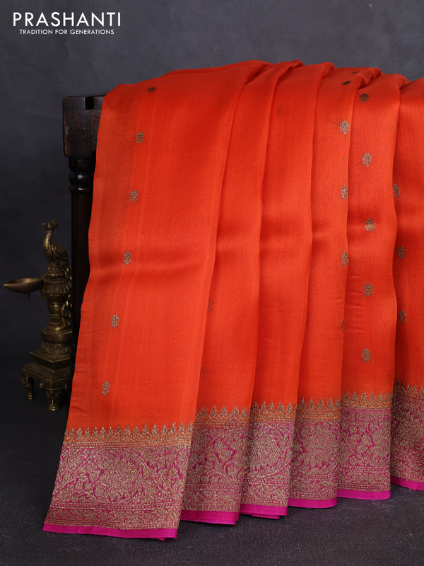 Banarasi organza silk saree orange and pink with allover thread & zari woven buttas and banarasi style border