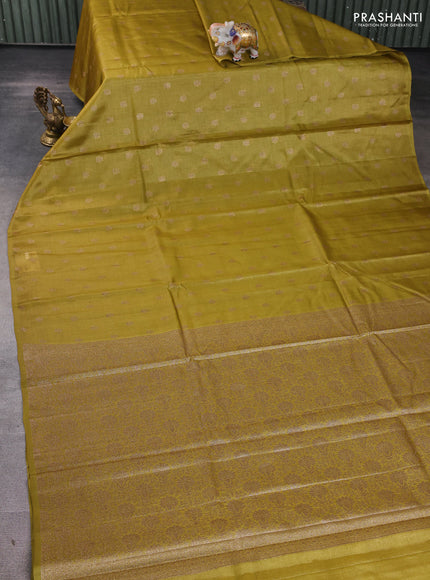 Banarasi tussar silk saree mustard green with allover thread & zari woven buttas in borderless style
