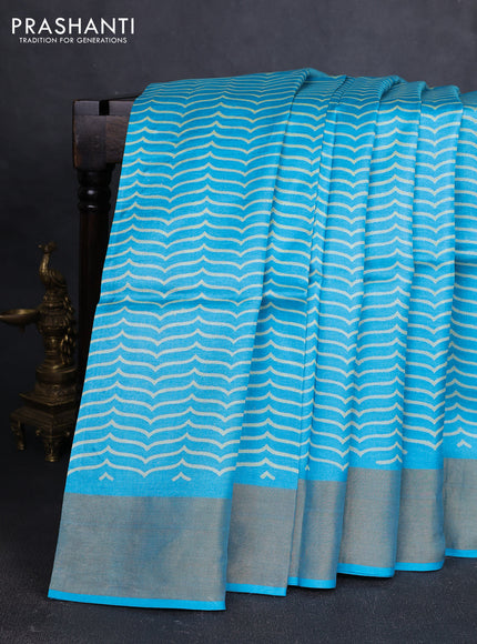 Pure tussar silk saree light blue with allover prints and zari woven border