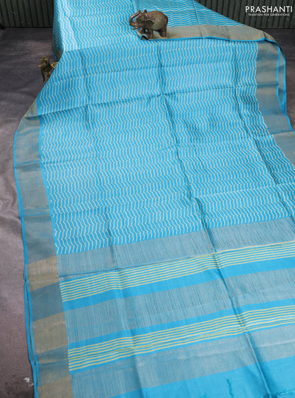 Pure tussar silk saree light blue with allover prints and zari woven border