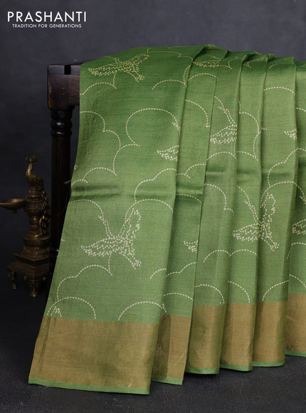 Pure tussar silk saree light green with allover prints and zari woven border