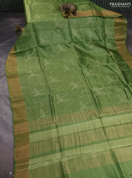 Pure tussar silk saree light green with allover prints and zari woven border