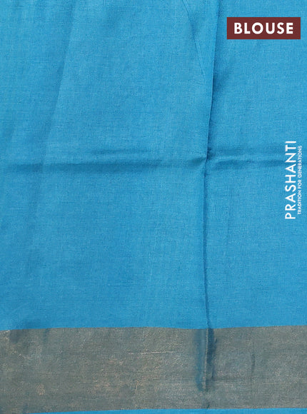 Pure tussar silk saree teal blue with allover prints and zari woven border