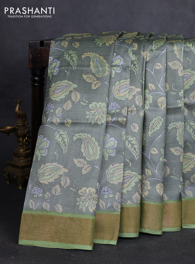 Pure tussar silk saree pastel green and light green with allover kalamkari prints and zari woven border