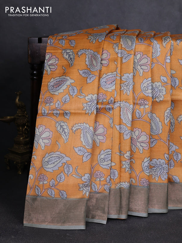 Pure tussar silk saree orange and pastel green with allover kalamkari prints and zari woven border