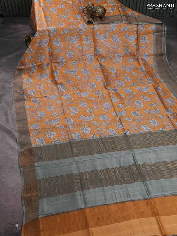 Pure tussar silk saree orange and pastel green with allover kalamkari prints and zari woven border