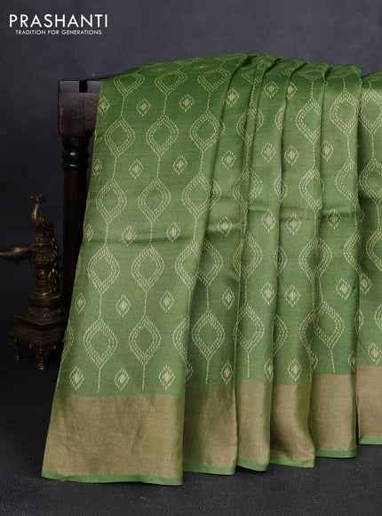 Pure tussar silk saree green with allover geometric prints and zari woven border