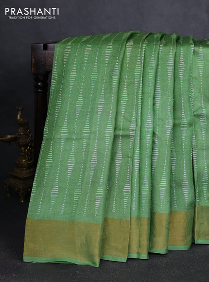 Pure tussar silk saree green with allover prints and zari woven border