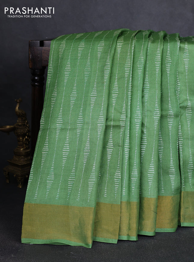 Pure tussar silk saree green with allover prints and zari woven border