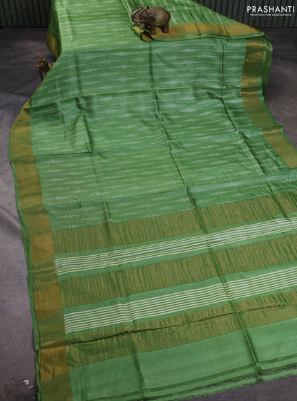 Pure tussar silk saree green with allover prints and zari woven border