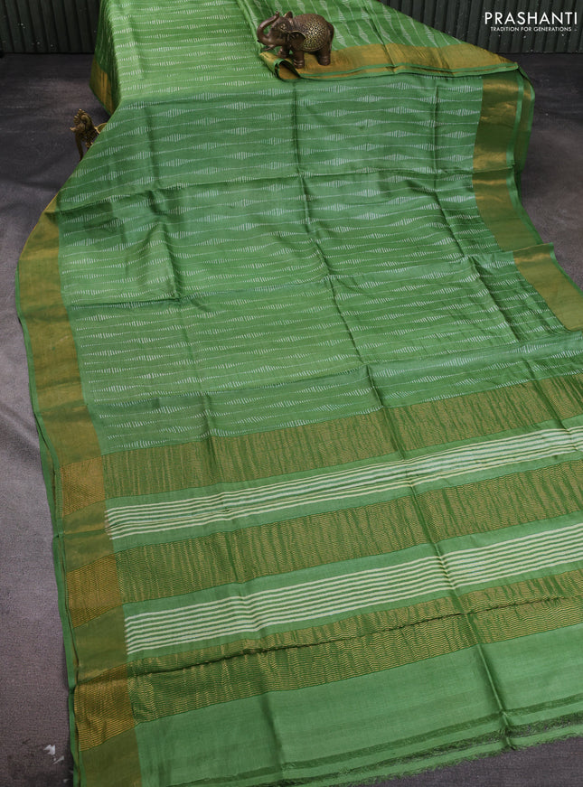 Pure tussar silk saree green with allover prints and zari woven border