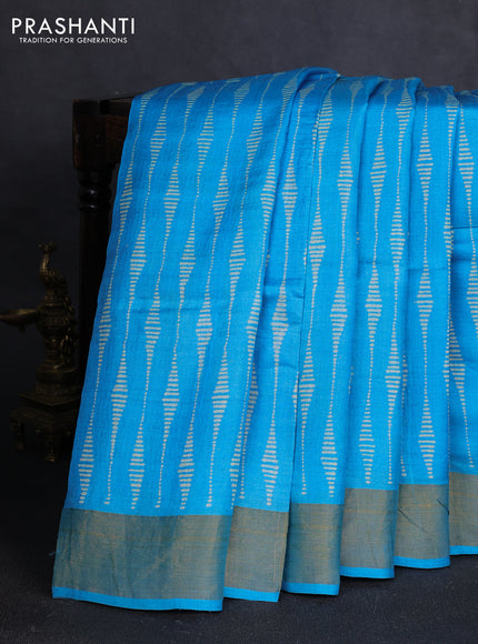 Pure tussar silk saree light blue with allover prints and zari woven border
