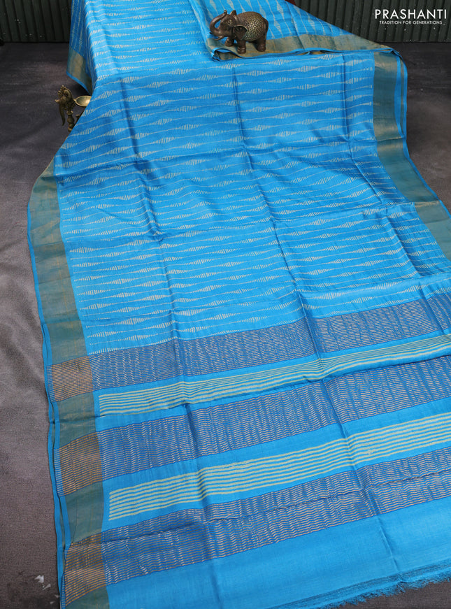 Pure tussar silk saree light blue with allover prints and zari woven border