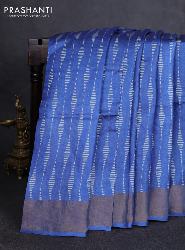 Pure tussar silk saree blue with allover prints and zari woven border