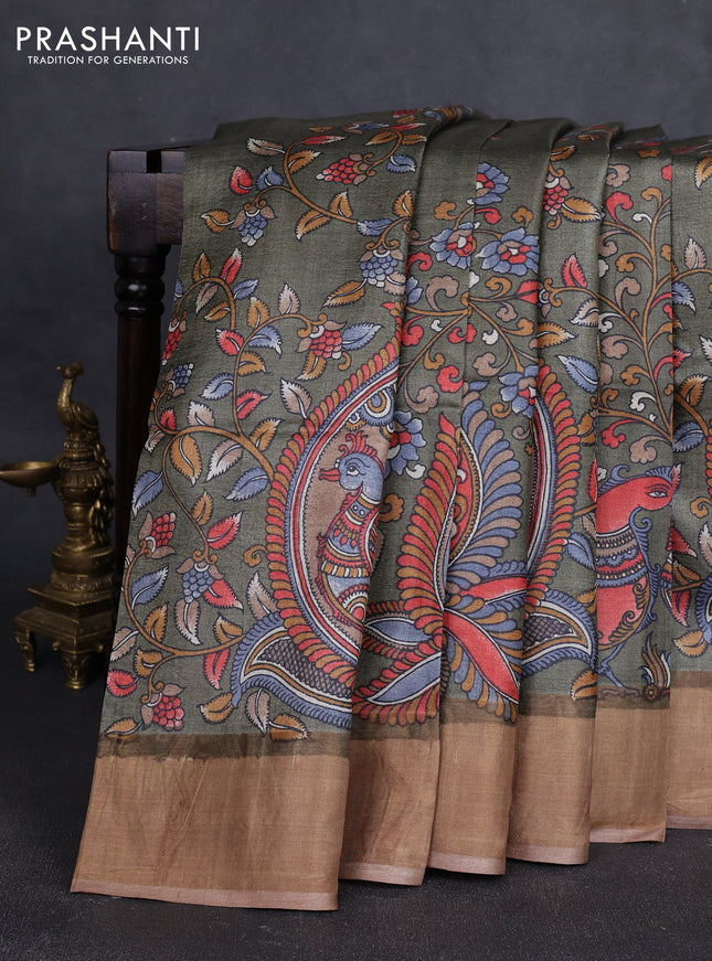 Pure tussar silk saree elaichi green and sandal with allover kalamkari prints and zari woven border