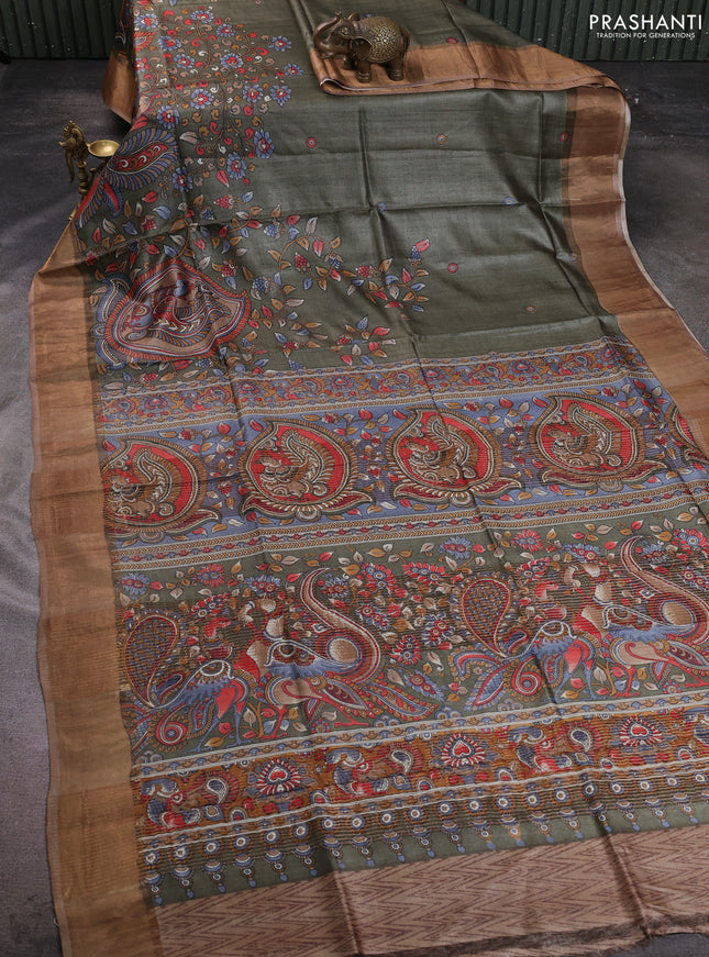 Pure tussar silk saree elaichi green and sandal with allover kalamkari prints and zari woven border