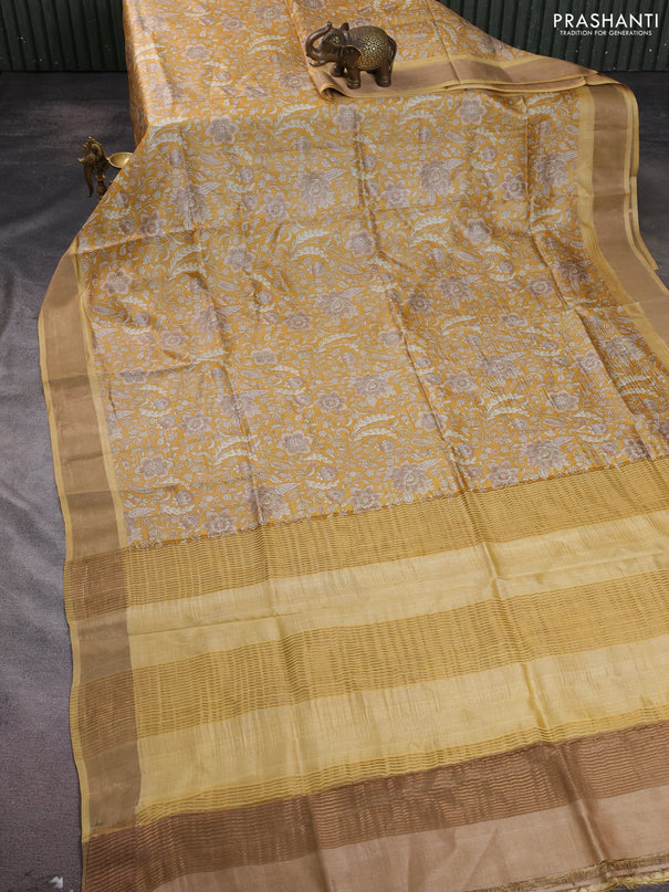 Pure tussar silk saree yellow with allover floral prints and zari woven border