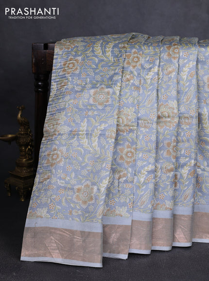 Pure tussar silk saree pastel grey with allover floral prints and zari woven border
