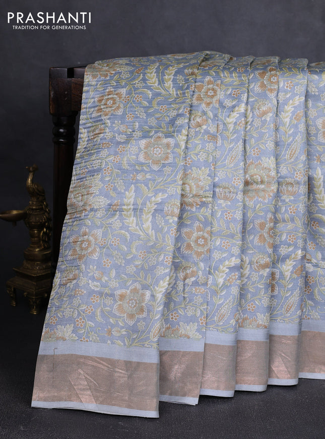 Pure tussar silk saree pastel grey with allover floral prints and zari woven border