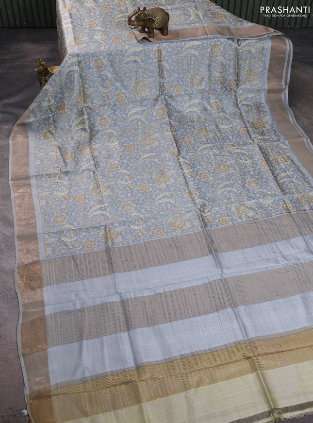 Pure tussar silk saree pastel grey with allover floral prints and zari woven border
