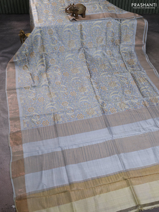 Pure tussar silk saree pastel grey with allover floral prints and zari woven border