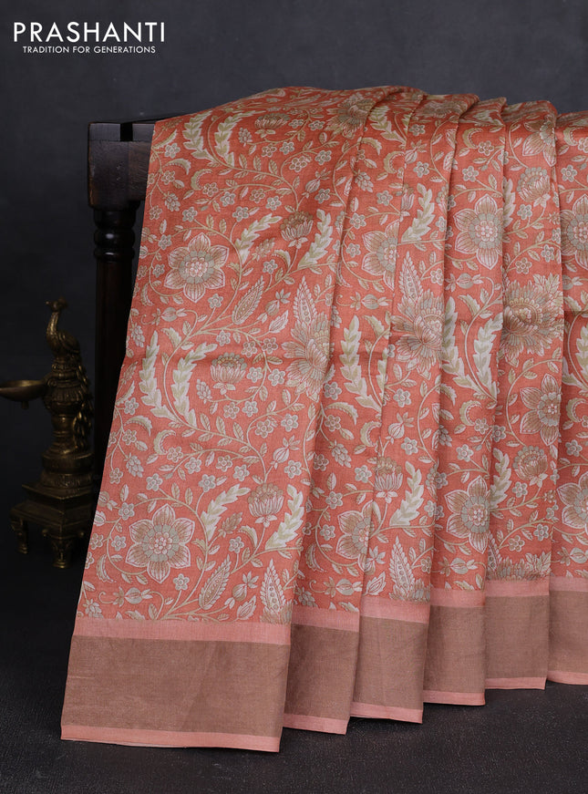 Pure tussar silk saree peach shade with allover floral prints and zari woven border