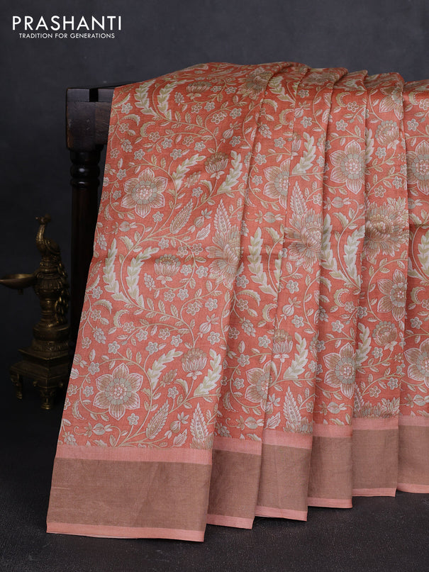 Pure tussar silk saree peach shade with allover floral prints and zari woven border