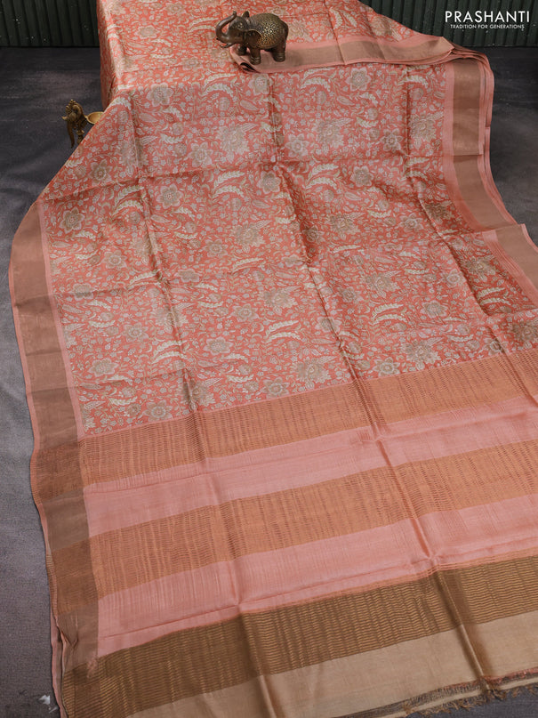Pure tussar silk saree peach shade with allover floral prints and zari woven border