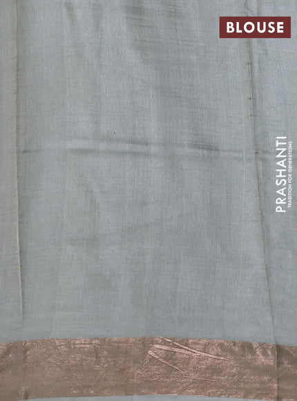 Pure tussar silk saree pastel green with allover floral prints and zari woven border