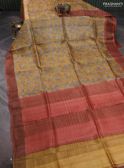 Pure tussar silk saree mustard yellow and orange with allover floral prints and zari woven border